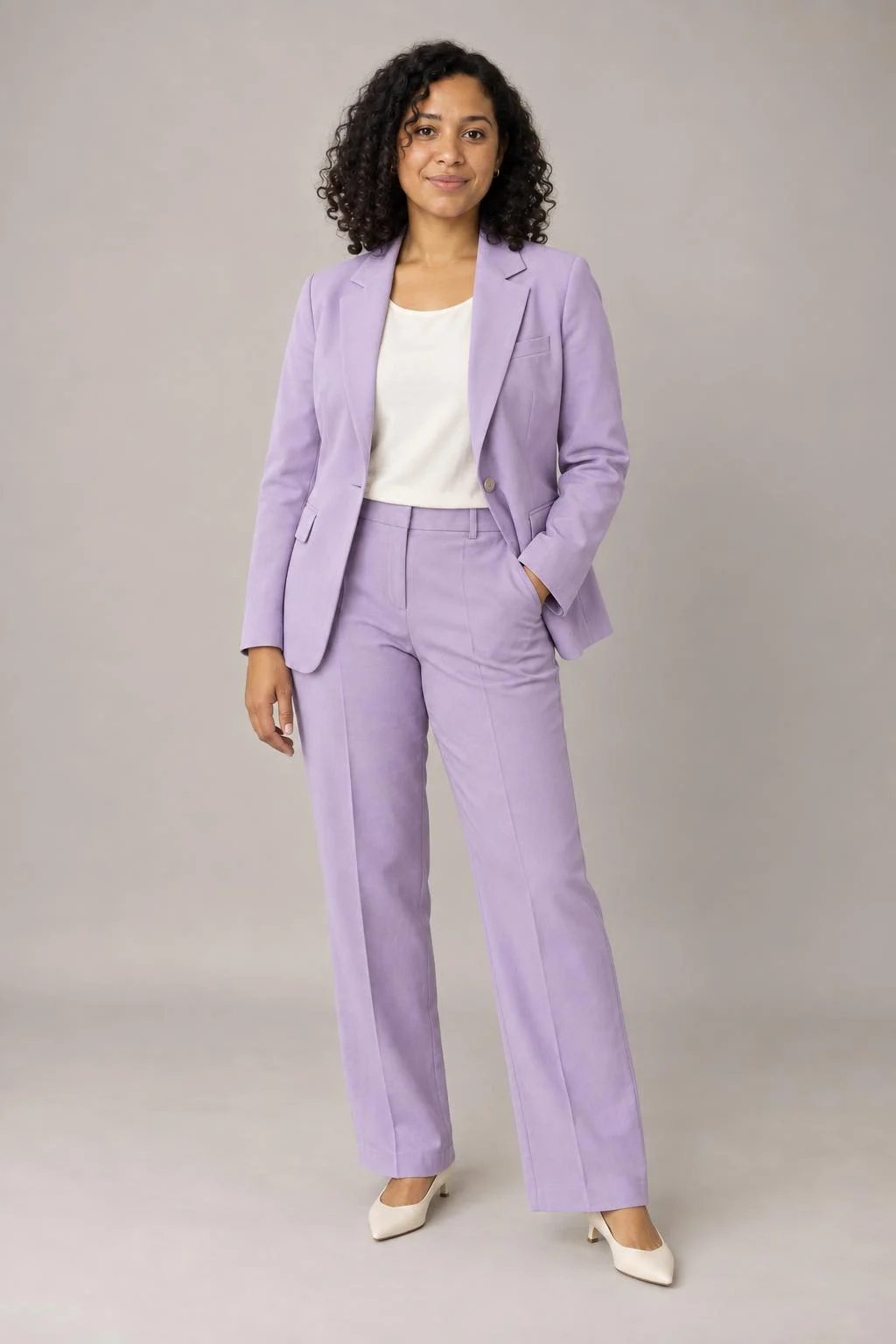 Example option B: the same fictional woman in the lilac suit